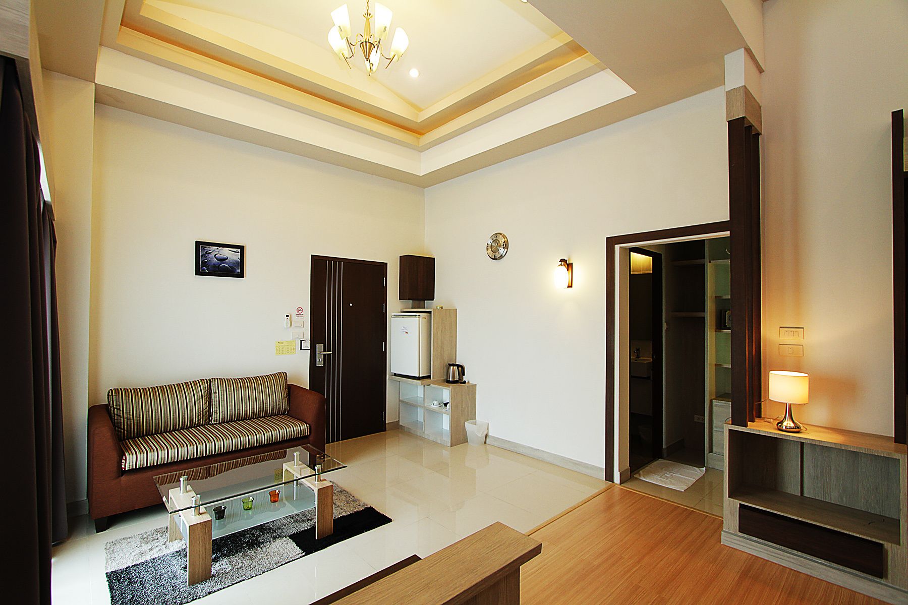 super superior king room (a-building) | living area | 40-inch led tv with cable channels, tv