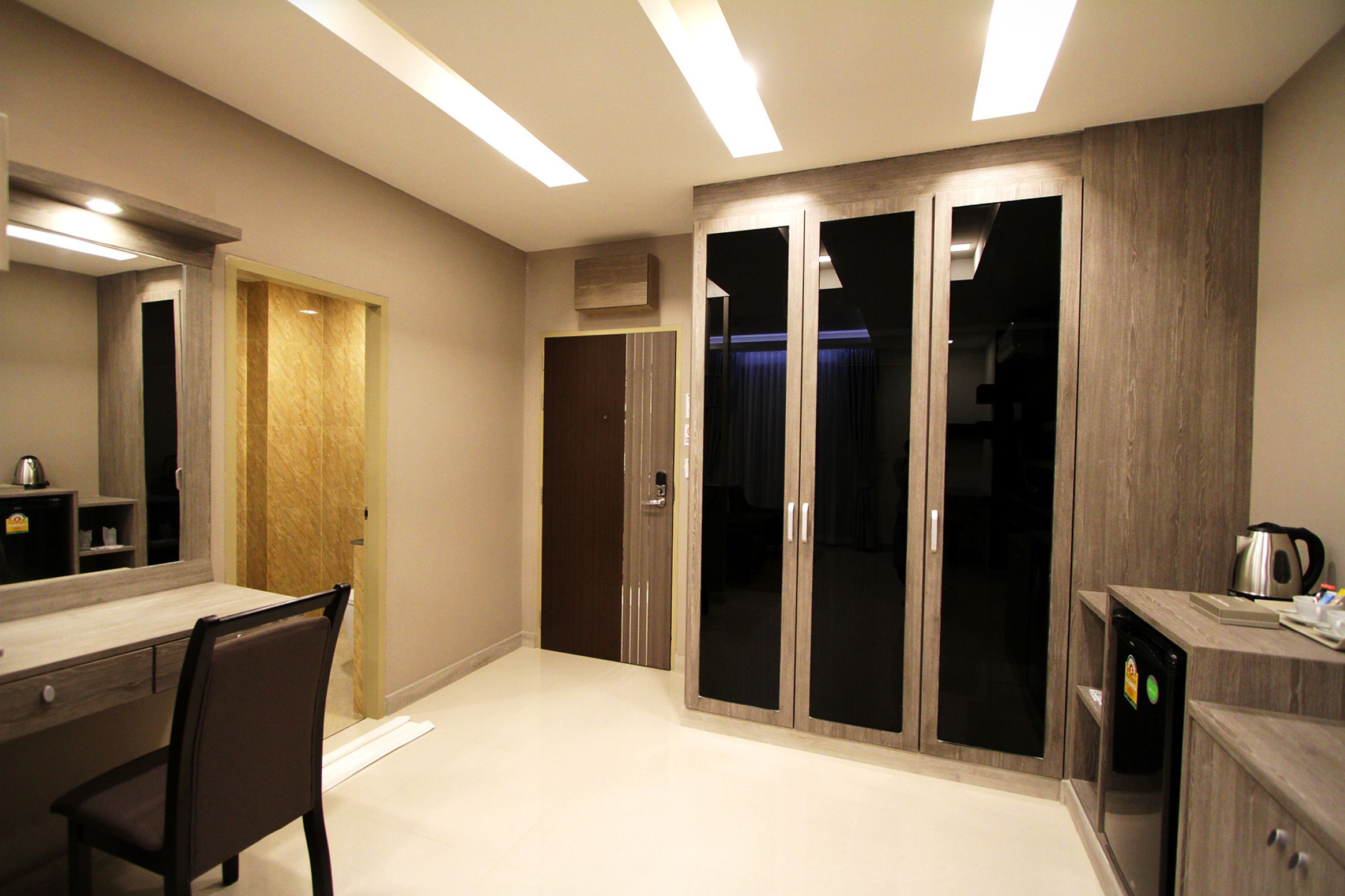 superior king room (b-building) | in-room safe, desk, laptop workspace, blackout curtains