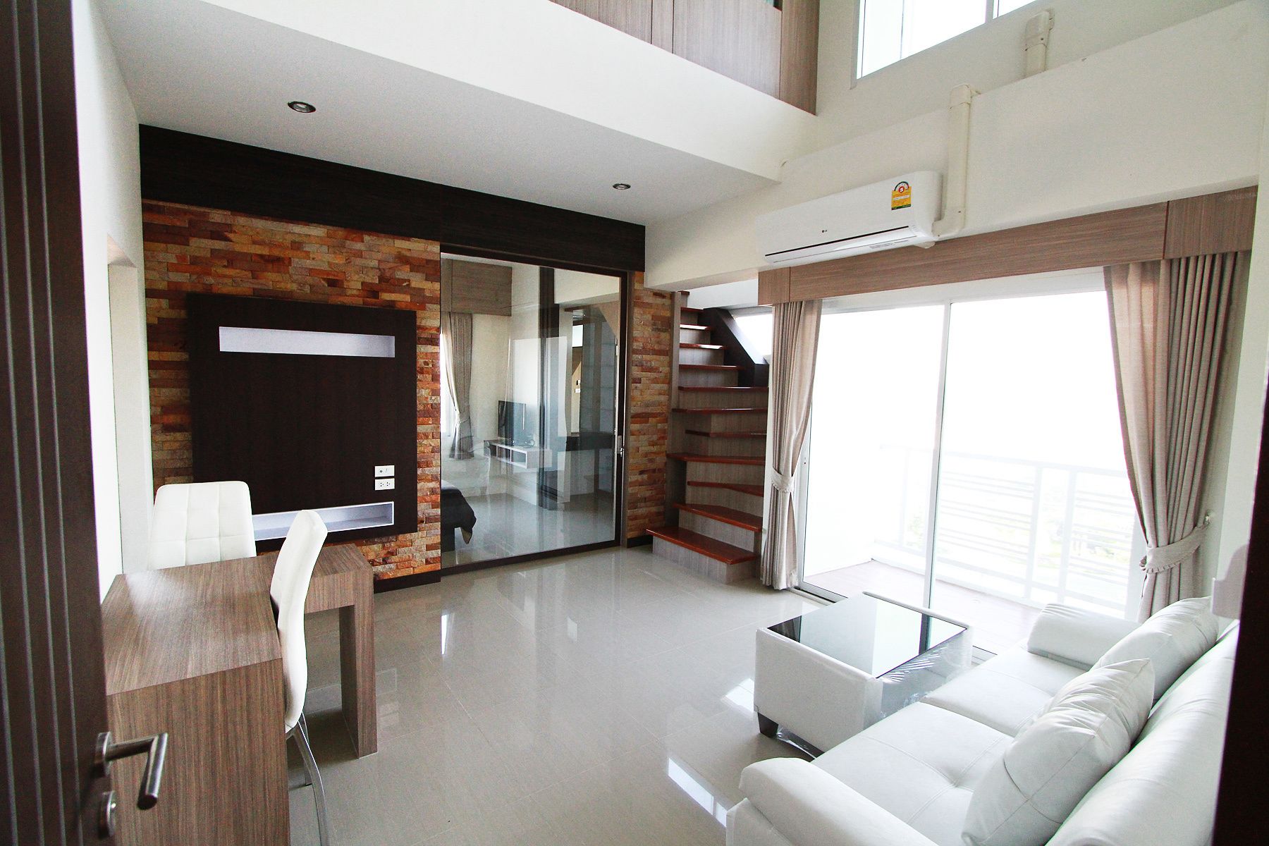 two bedrooms duplex (condo) | living room | 40-inch led tv with cable channels, tv