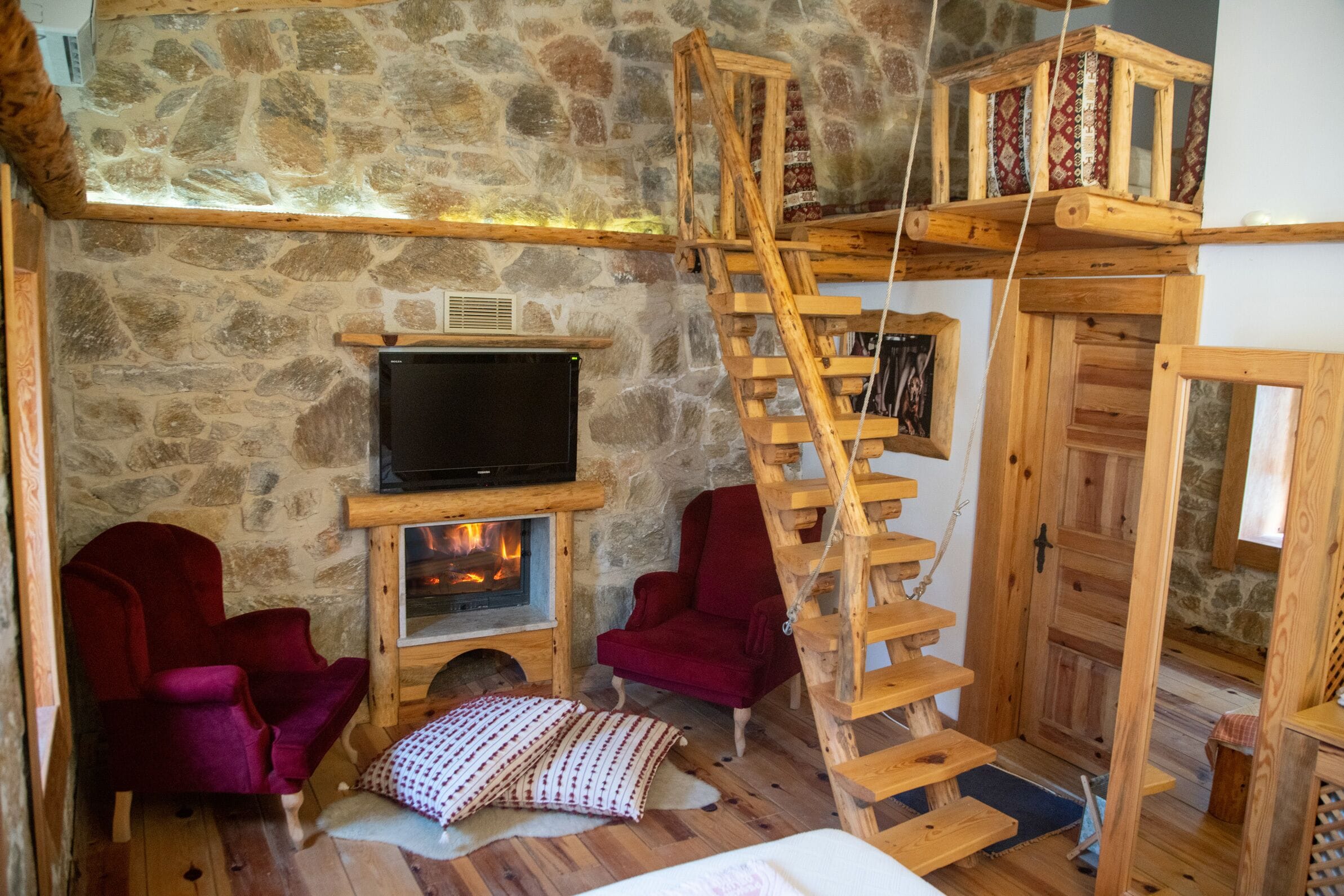 junior room, 1 bedroom, fireplace, pool view | living area | lcd tv