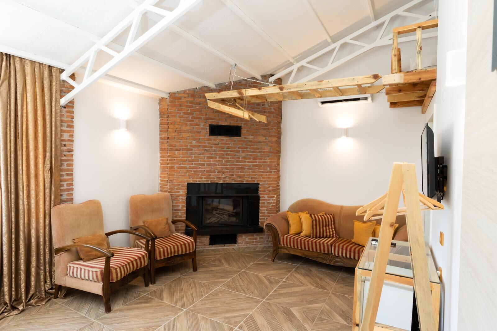 superior studio suite | living area | lcd tv