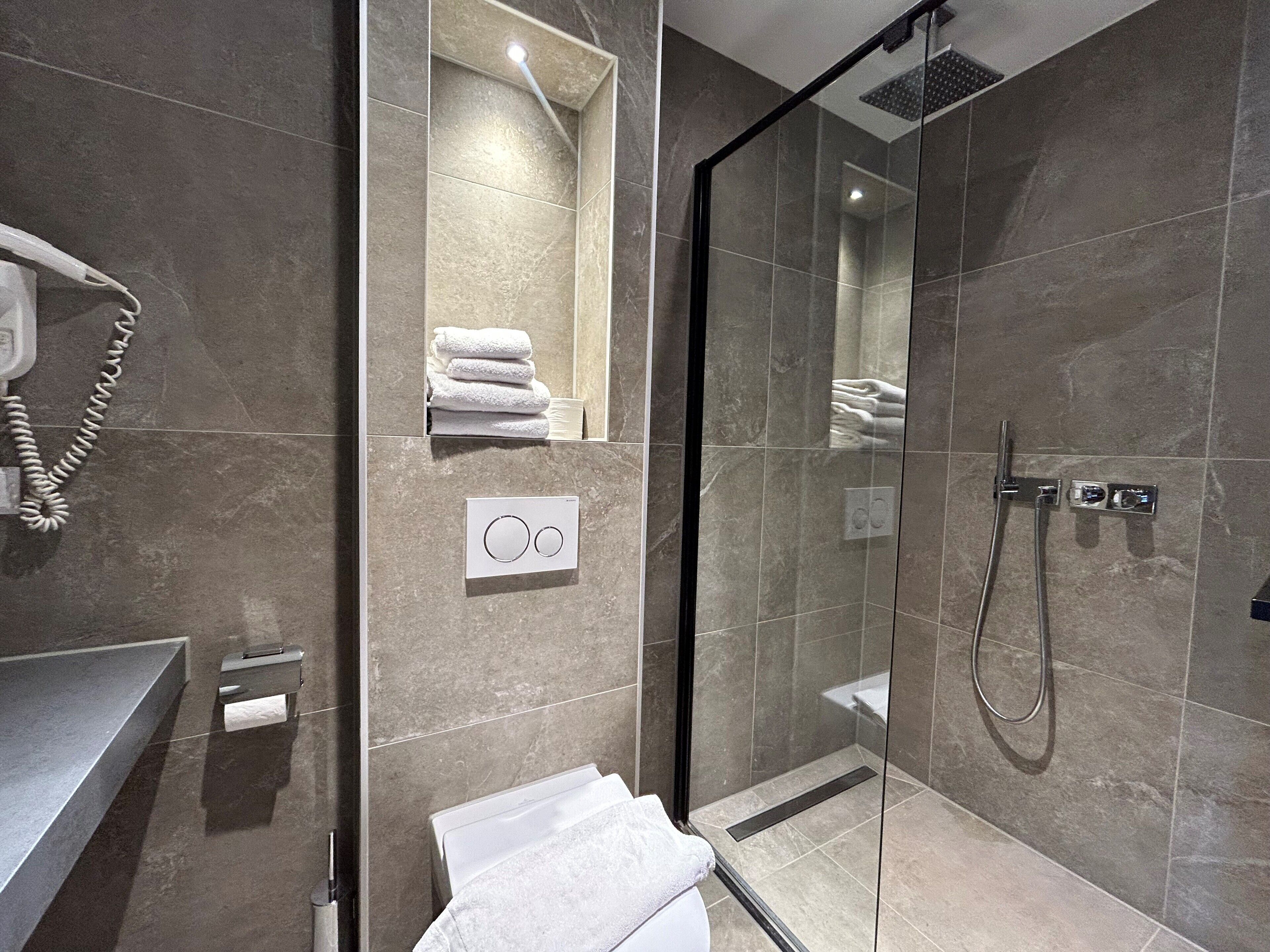 economy twin room, 2 single beds | bathroom | free toiletries, hair dryer, towels, soap