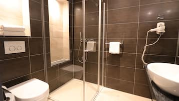 Standard Double Room, 1 Queen Bed | Bathroom | Shower, rainfall showerhead, free toiletries, hair dryer