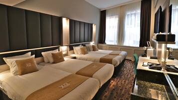 Standard Quadruple Room, Multiple Beds | In-room safe, desk, free WiFi, bed sheets