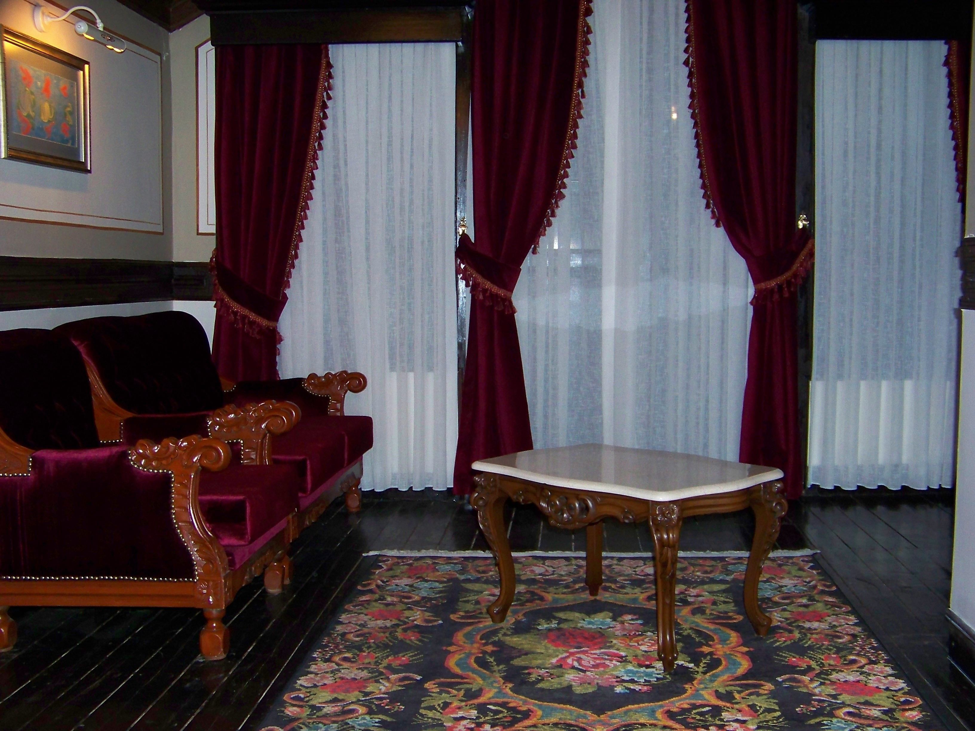 premium suite, 1 king bed | living area | 23-inch led tv with satellite channels, tv