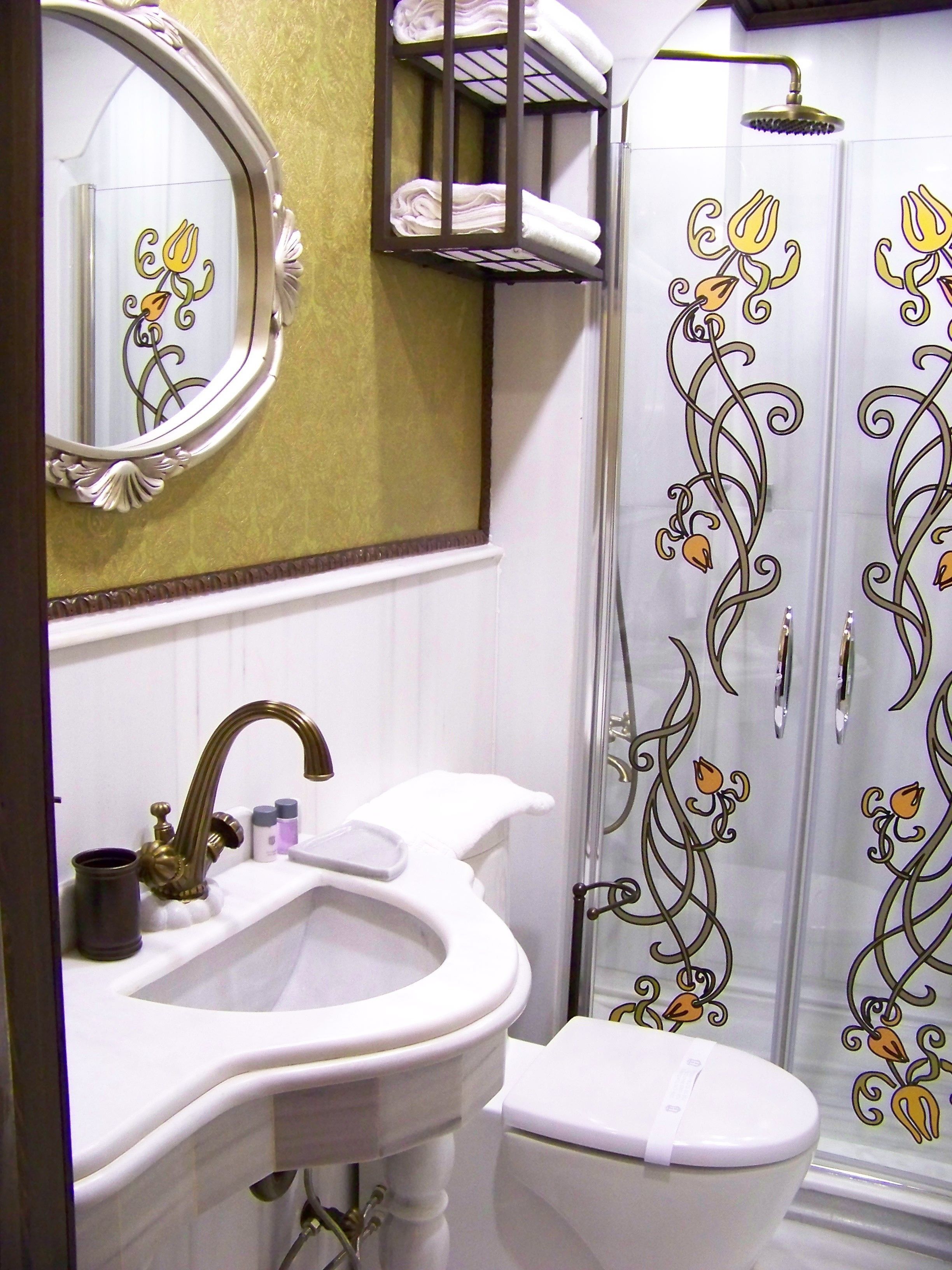 deluxe single room | bathroom | shower, free toiletries, hair dryer, bathrobes