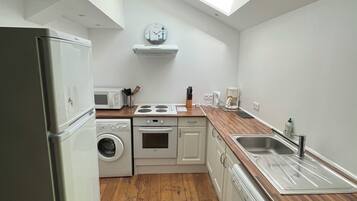 Apartment (Gite Bannes) | Private kitchen | Full-size fridge, microwave, cookware/dishes/utensils