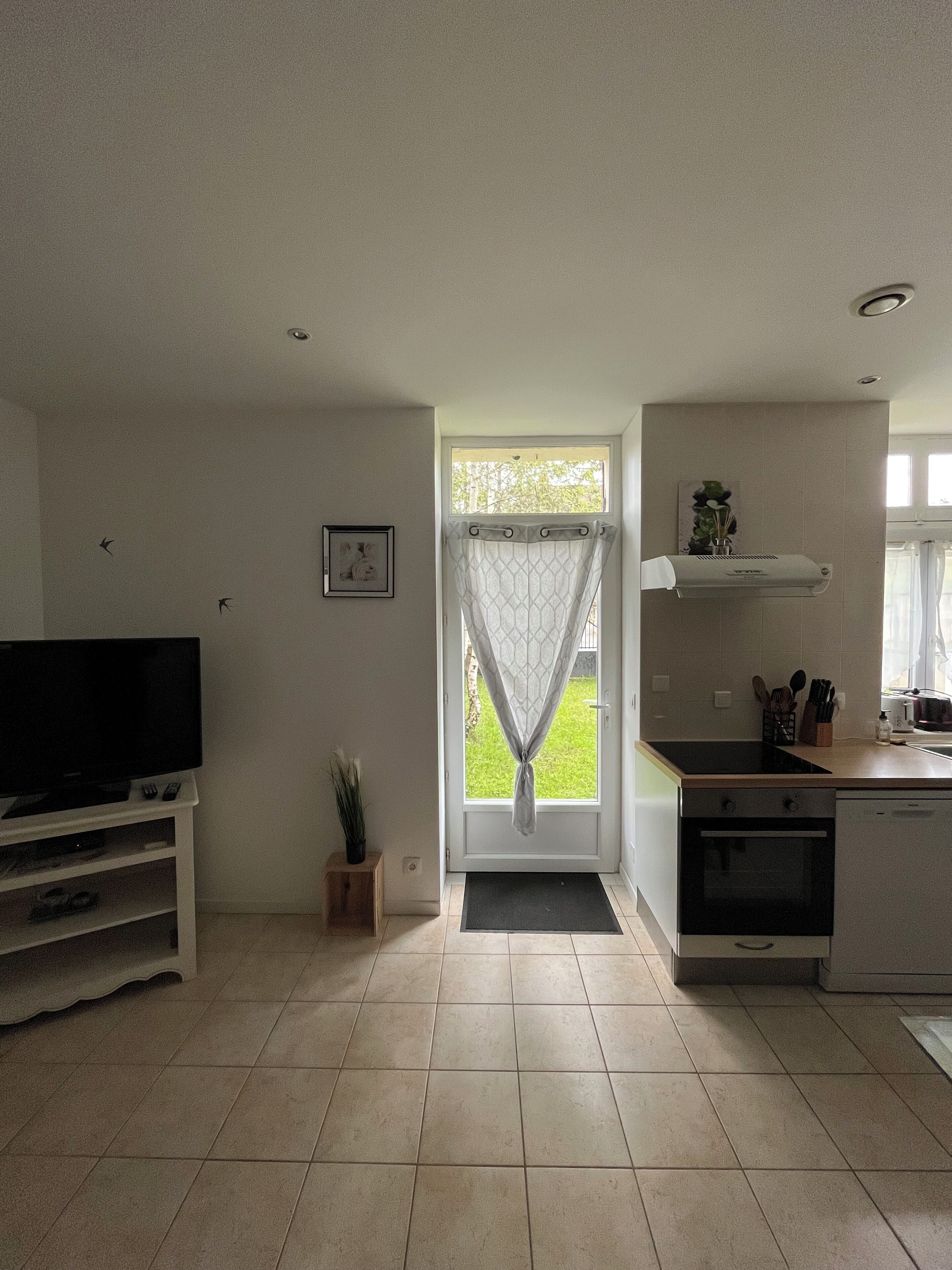 Apartment (Gite Bridoire) | Living area | Flat-screen TV