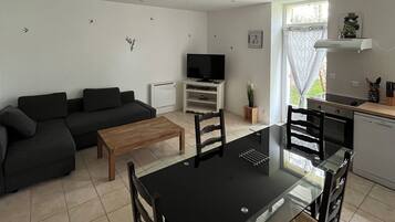 Apartment (Gite Bridoire) | Living area | Flat-screen TV
