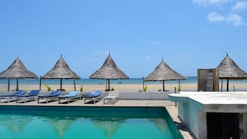 2 outdoor pools, open 9:00 AM to 6:00 PM, pool umbrellas, pool loungers