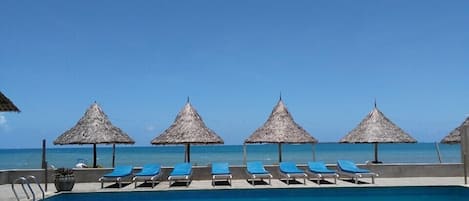 2 outdoor pools, open 9:00 AM to 6:00 PM, pool umbrellas, sun loungers