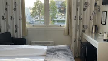 Desk, blackout curtains, iron/ironing board, free cots/infant beds
