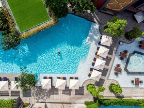 2 outdoor pools, open 7:00 AM to 8:00 PM, pool umbrellas, pool loungers