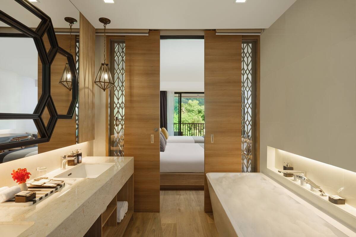 separate bathtub and shower, deep-soaking bathtub, rainfall showerhead