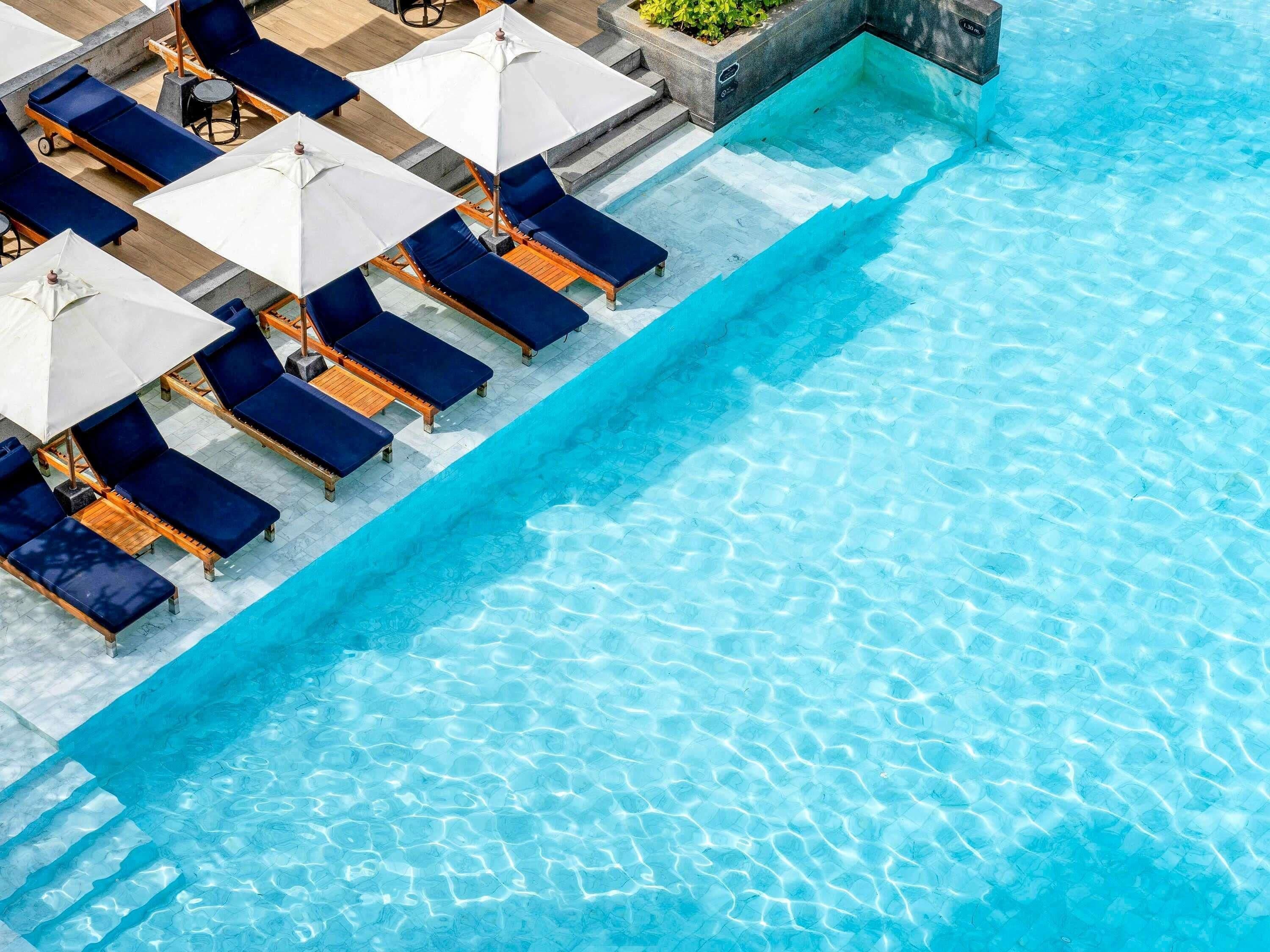 2 outdoor pools, pool umbrellas, pool loungers