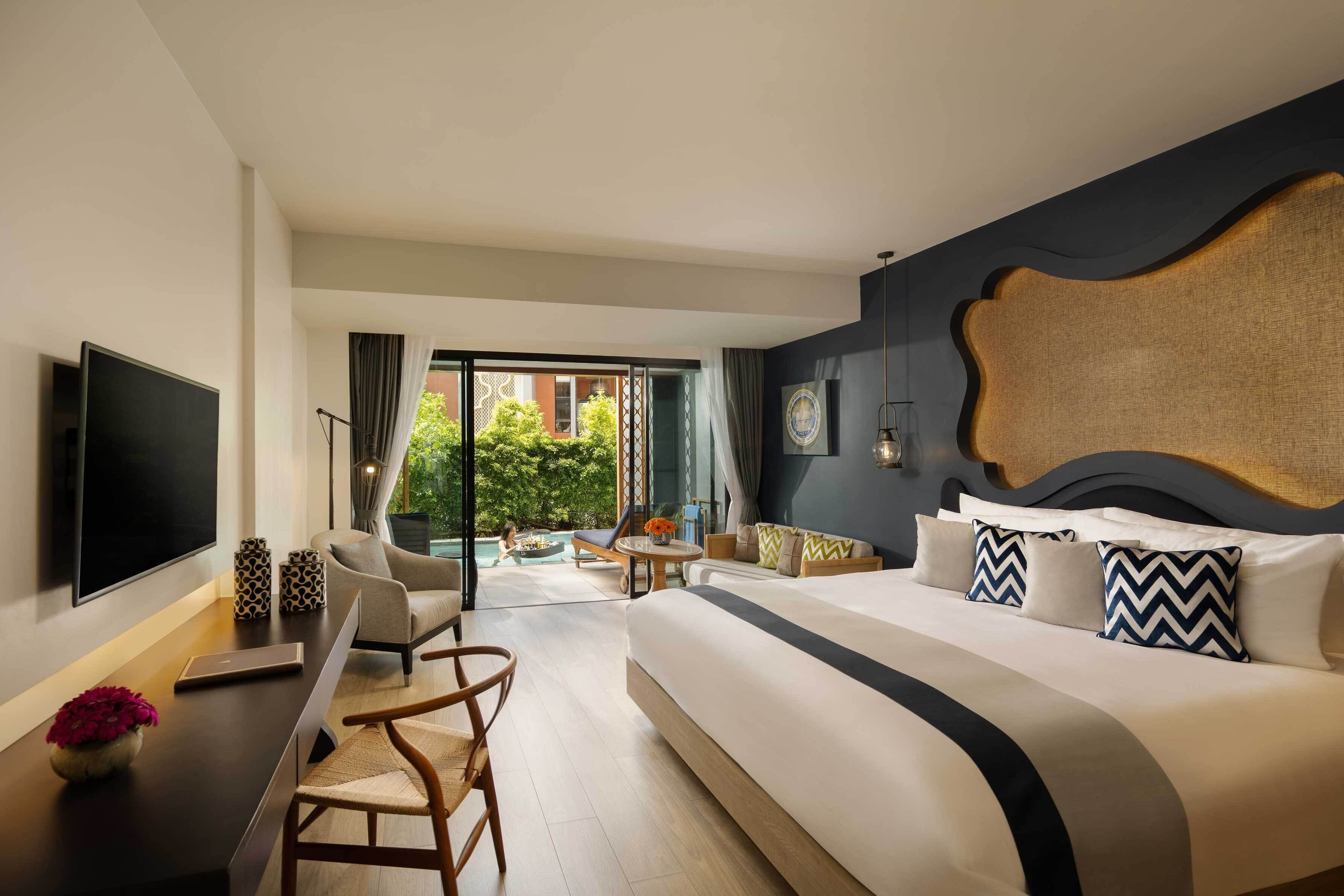 Suíte luxo, 1 cama King, acesso à piscina, vista para o jardim | Roupas de cama premium, edredons de pluma, frigobar, cofres nos quartos