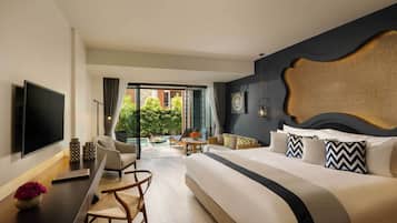 Suíte luxo, 1 cama King, acesso à piscina, vista para o jardim | Roupas de cama premium, edredons de pluma, frigobar, cofres nos quartos