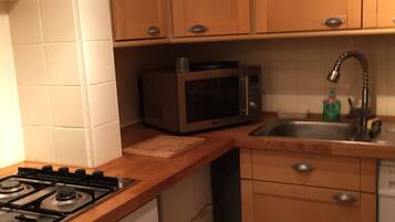 Apartemen, 2 kamar tidur | Dapur pribadi | Lemari es besar, microwave, oven, dan kompor