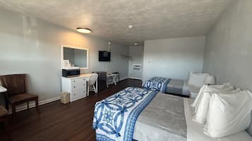 Desk, laptop workspace, blackout drapes, iron/ironing board