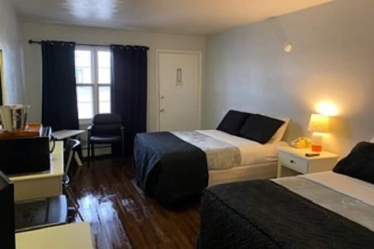 Basic Room, 2 Double Beds | Desk, laptop workspace, blackout drapes, iron/ironing board