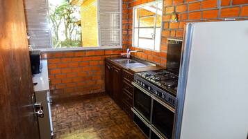 Apartment | Private kitchen | Fridge, microwave, stovetop, coffee/tea maker