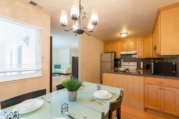 Comfort Condo, 2 Bedrooms | Private kitchen | Fridge, microwave, oven, stovetop