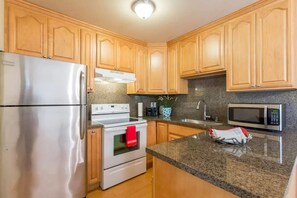 Comfort Condo, 2 Bedrooms | Private kitchen | Fridge, microwave, oven, stovetop