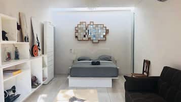 Habitación Deluxe | Decoración personalizada y cortinas blackout