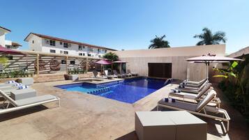 Outdoor pool, open 8 AM to 9:30 PM, pool umbrellas, pool loungers