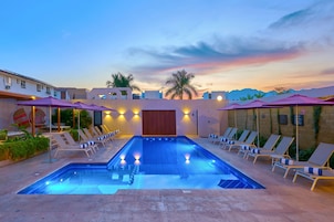 Outdoor pool, open 8 AM to 9:30 PM, pool umbrellas, pool loungers