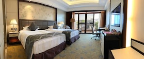A hotel room with two beds, a desk, a chair, and a balcony with a view. - Tongli Lake Resort Phase2 (Suzhou)