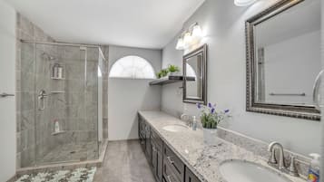 Combined shower/tub, hair dryer, towels, soap