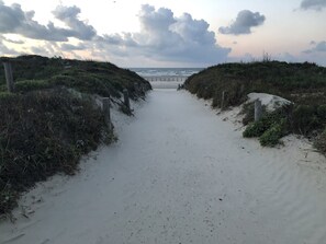 On the beach, sun-loungers