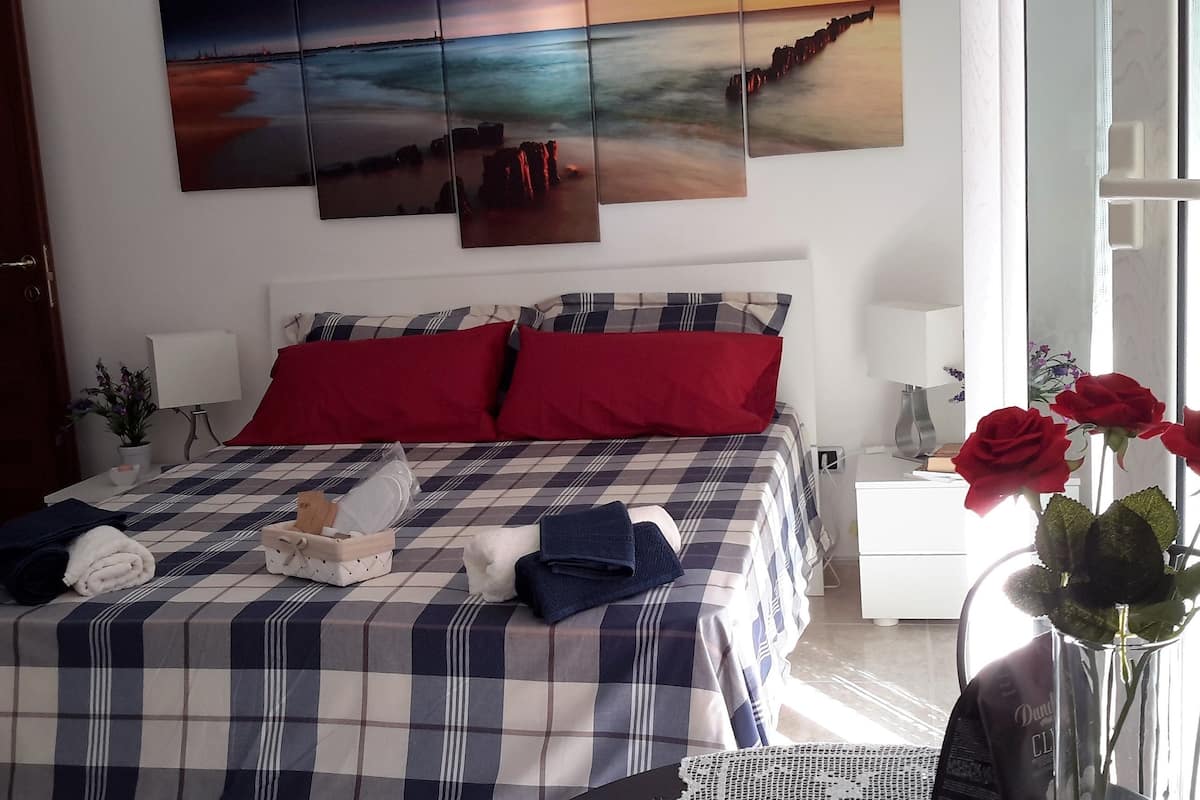 Premium bedding, down duvets, desk, iron/ironing board