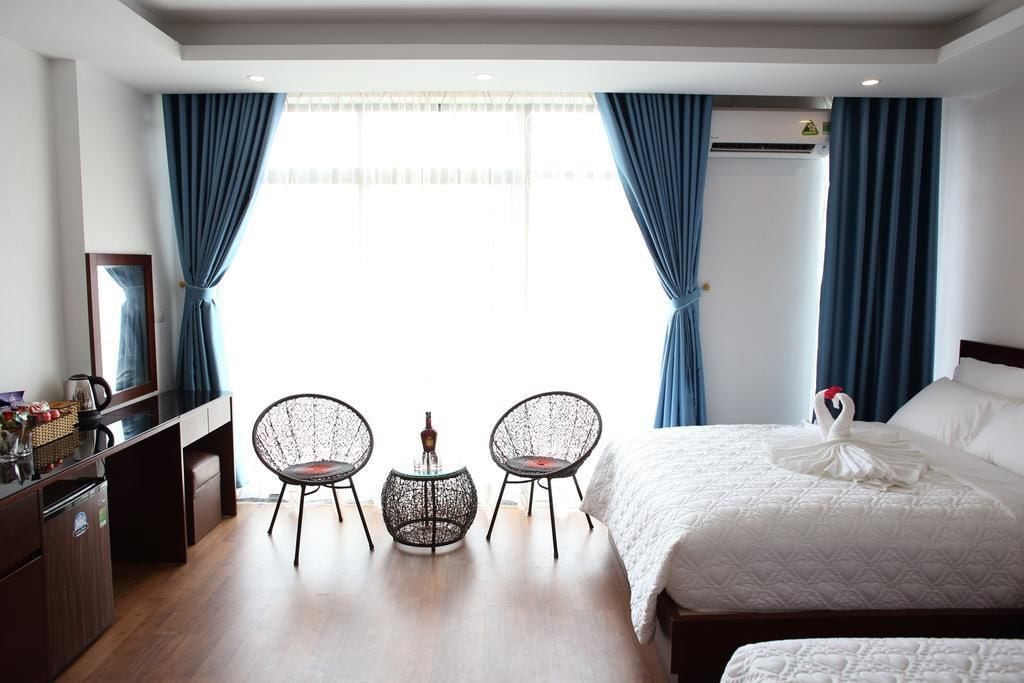 Deluxe Quadruple Room | Premium bedding, down comforters, memory foam beds, minibar