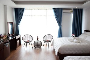 Deluxe Quadruple Room | Premium bedding, down duvets, memory-foam beds, minibar - Camellia Hotel (Ninh Binh)