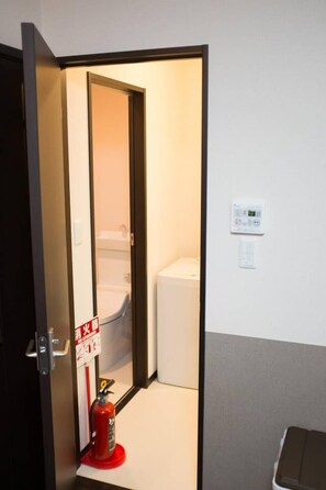 Villa | Bathroom | Separate tub and shower, free toiletries, hair dryer, slippers