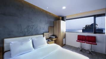 Deluxe Double Room, Ocean View | In-room safe, individually decorated, individually furnished