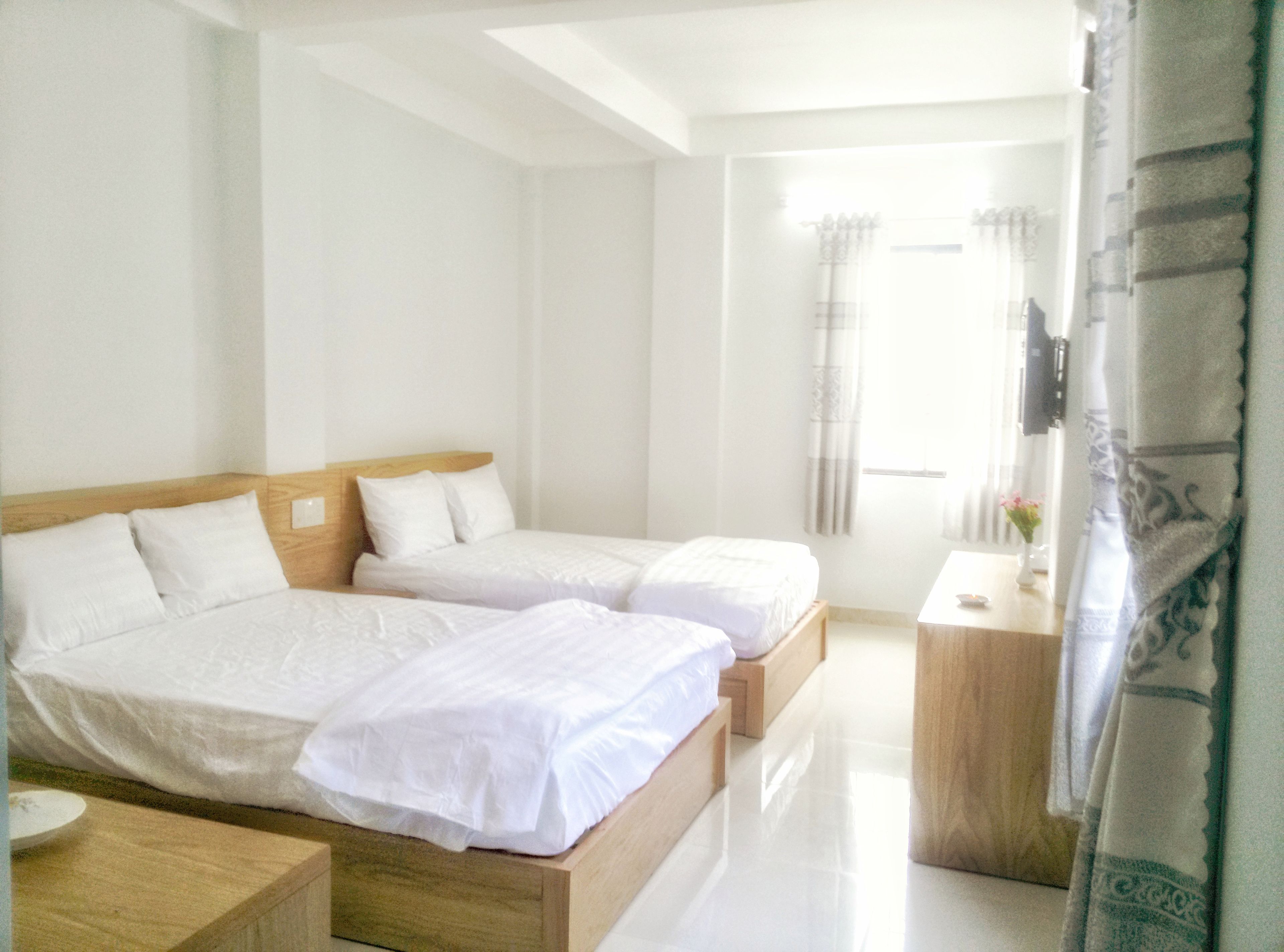 Deluxe kamer | Een bureau, gratis wifi, beddengoed