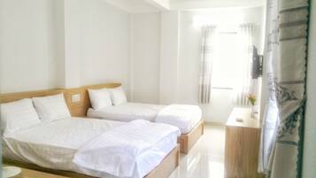 Deluxe kamer | Een bureau, gratis wifi, beddengoed