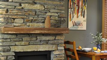 Apartment, 1 Bedroom | Living area | Flat-screen TV, fireplace