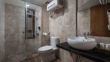 Shower, free toiletries, hair dryer, slippers