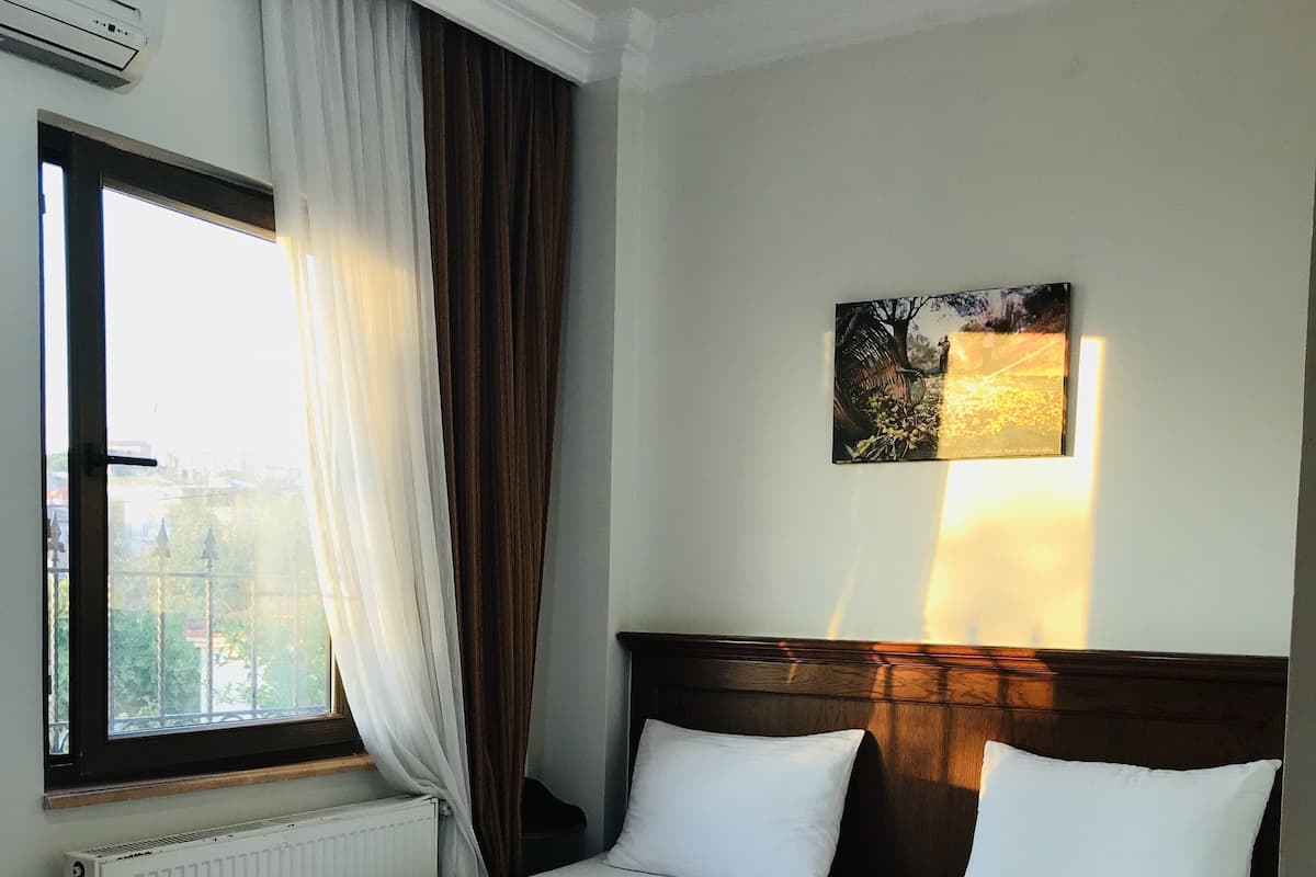Chambre Supérieure Double ou avec lits jumeaux, vue jardin
