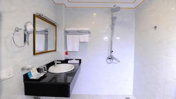 Designer toiletries, hair dryer, bathrobes, slippers