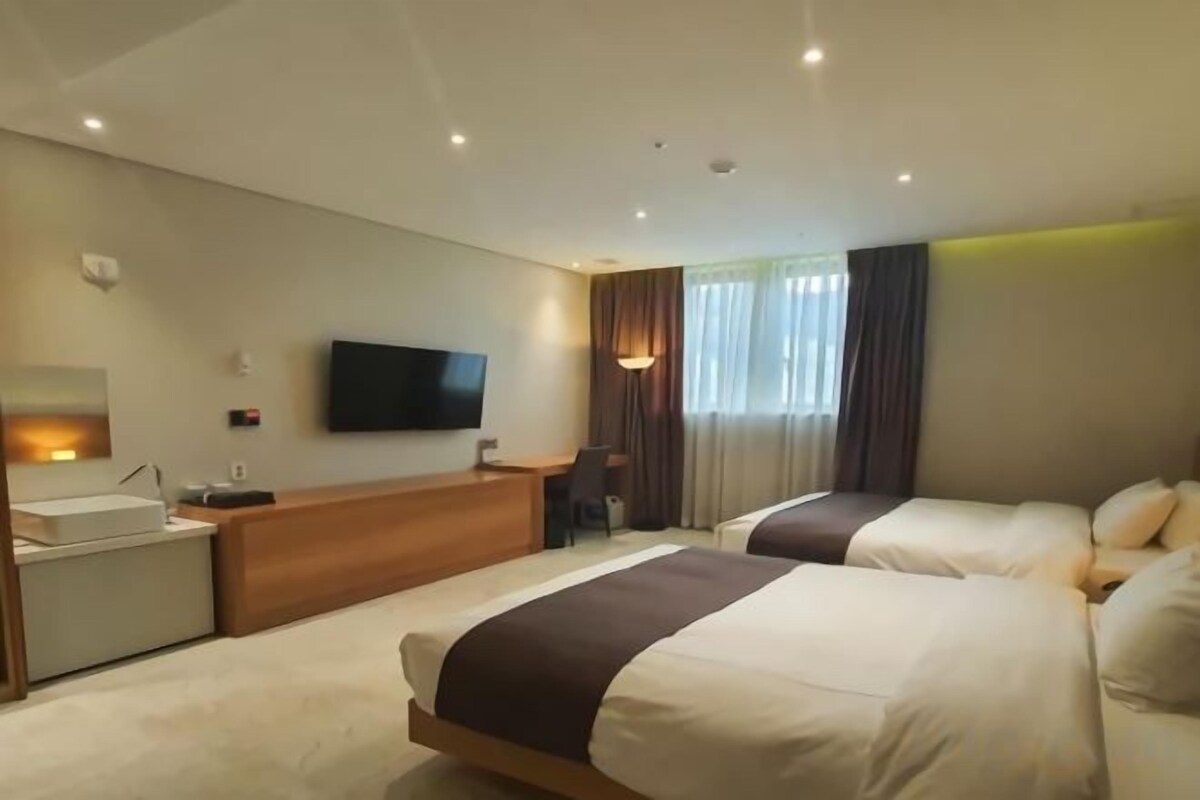 Premium bedding, down comforters, blackout drapes, soundproofing