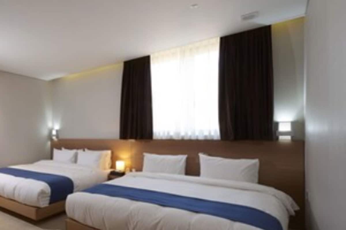 Premium bedding, down comforters, blackout drapes, soundproofing