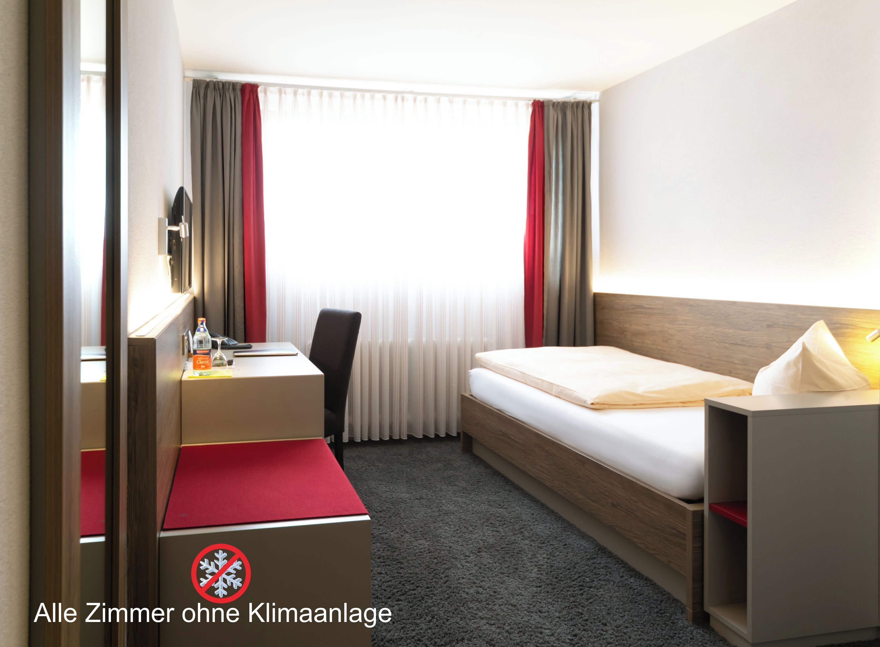 Standard Single Room | Hypo-allergenic bedding, in-room safe, desk, iron/ironing board