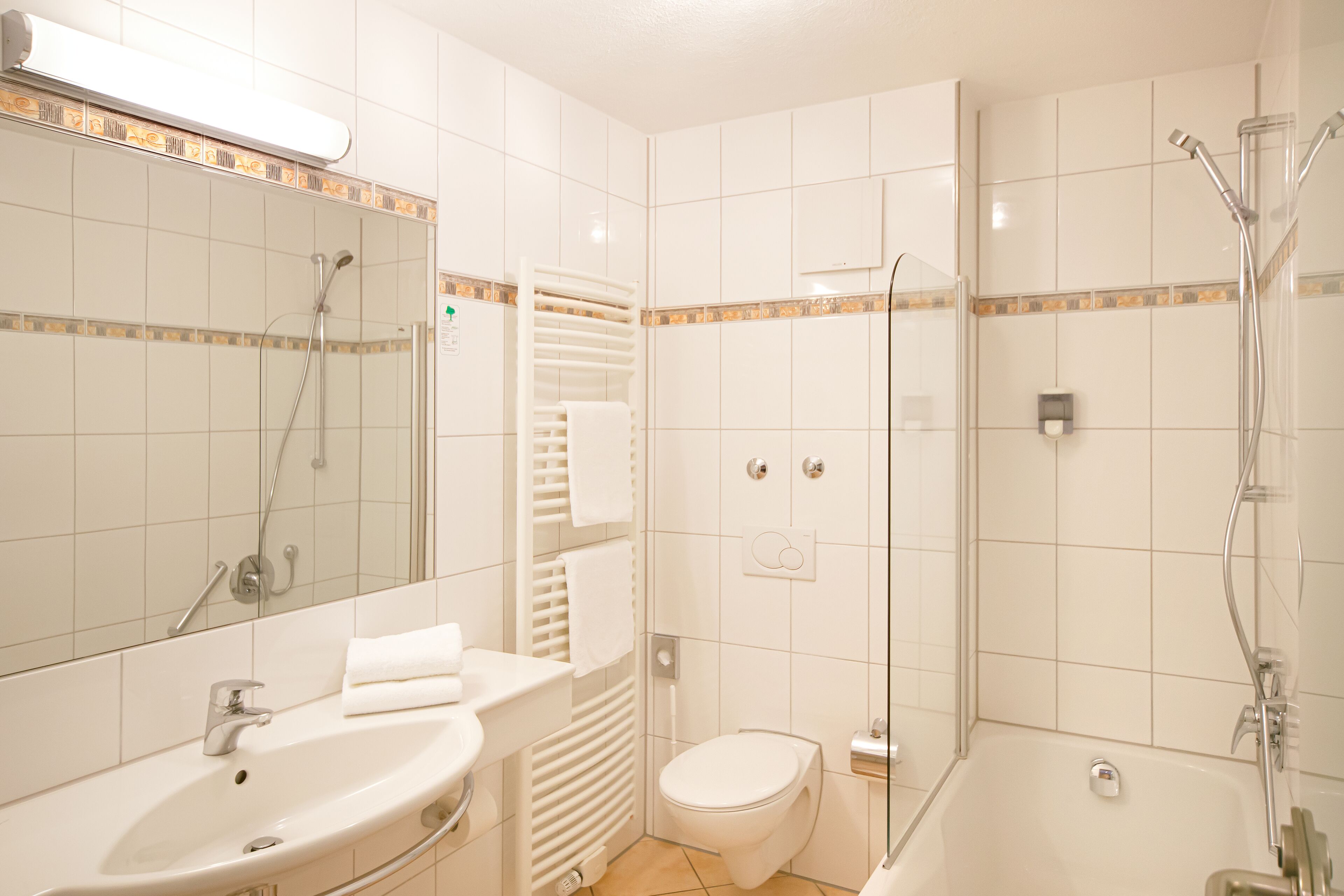 comfort double room | bathroom | hair dryer, towels