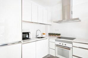 Deluxe Apartment, 2 Bedrooms | Private kitchen | Fridge, microwave, oven, stovetop - Mar Apartments (Barcelona)