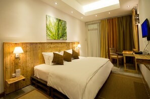Ropa de cama de alta calidad y minibar 